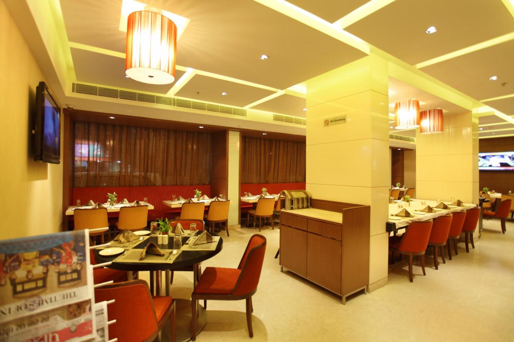 Comfort Inn Legacy Rajkot Restaurant foto